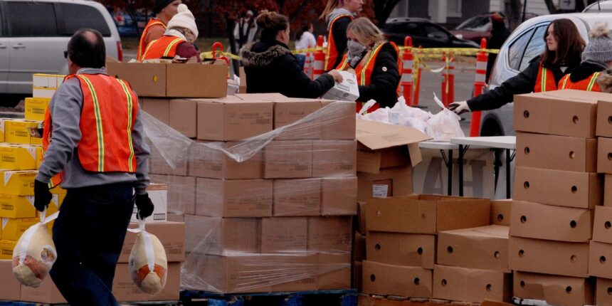 turkey-toss185c-1 Eviction expungement guide distributed to needy families for the holidays